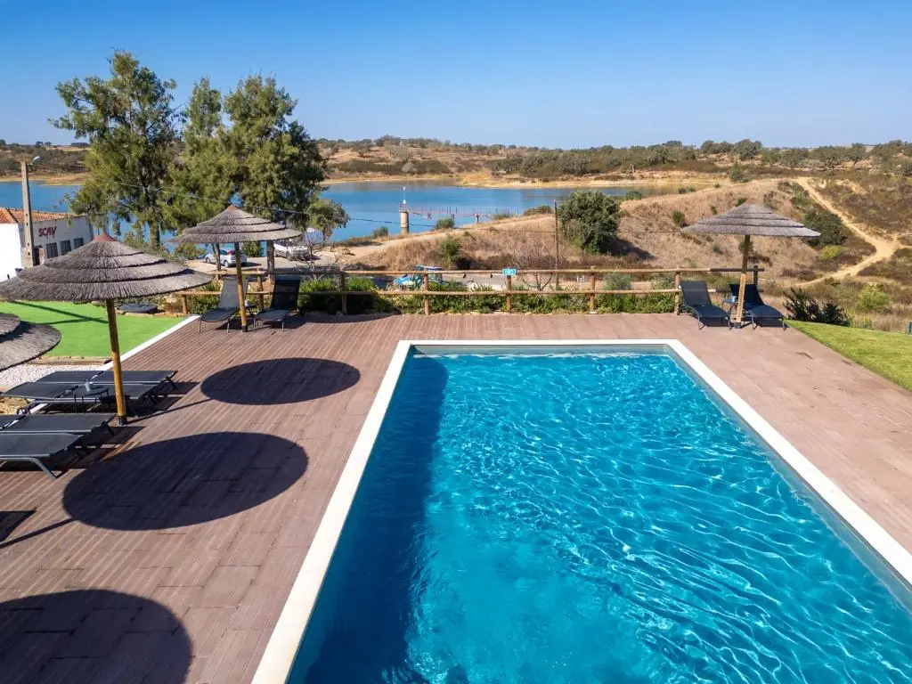 Year-round outdoor pool overlooking the Alentejo lake